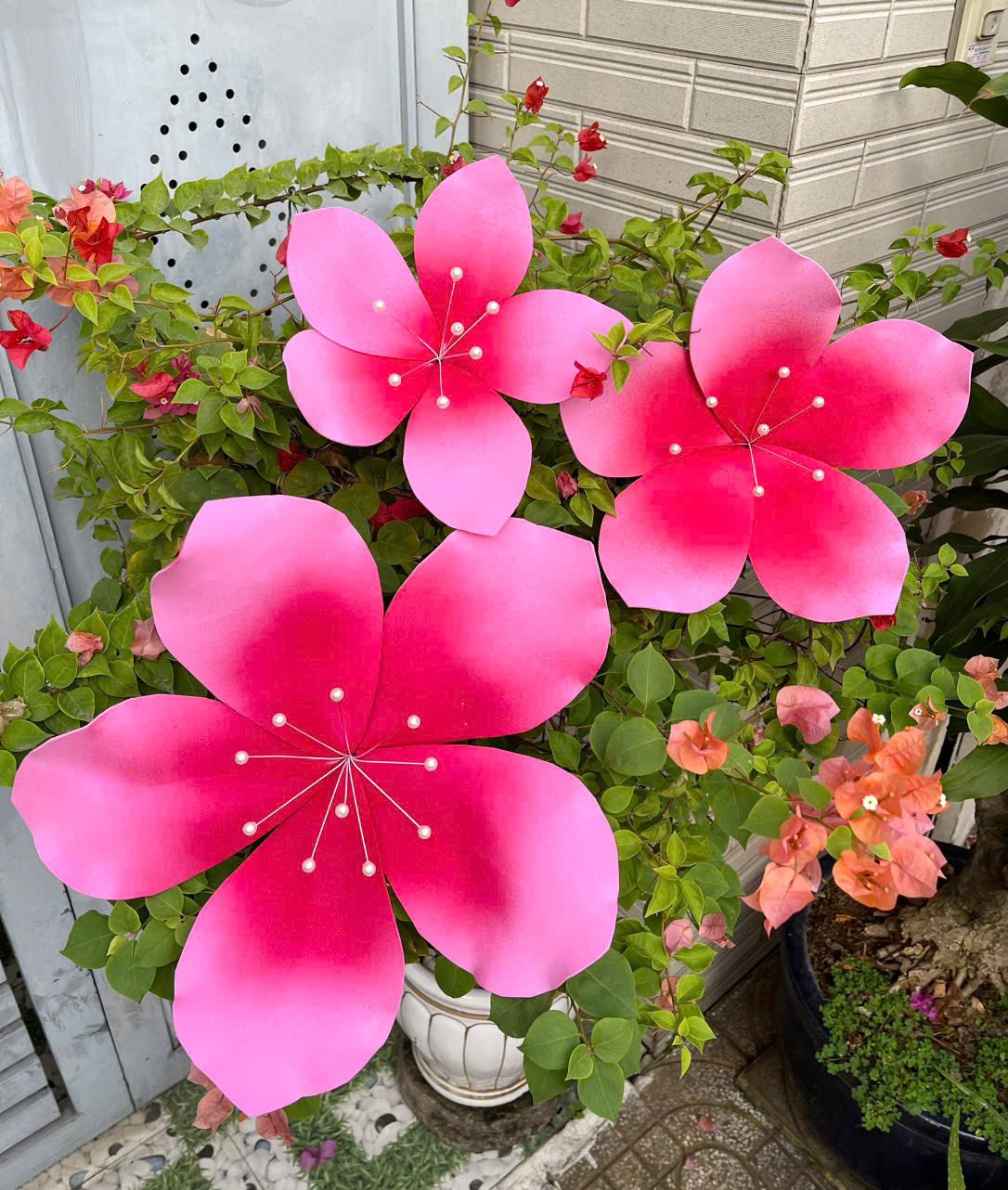 Hoa đ&agrave;o m&uacute;t xốp m&agrave;u hồng nhụy ngọc trai trang tr&iacute; tết