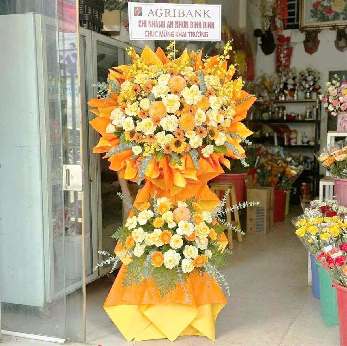 Kệ Hoa Mừng Khai Trương 2 Tầng Tone Cam Hoa Hồng Mix Đồng Tiền